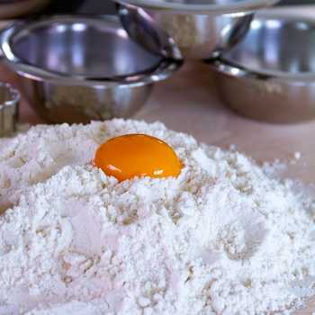 image of egg on flour
